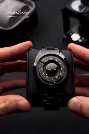 magnetic rotating disc watch with an Arabic dial and a black