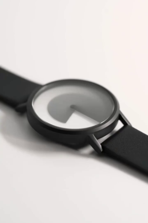 Design Gradient Watch in black with a leather strap.